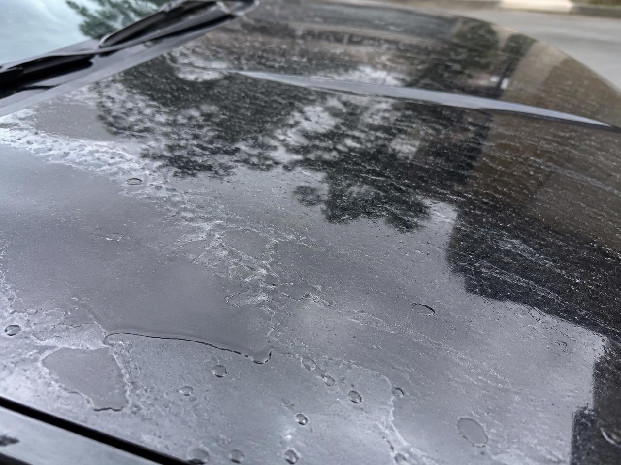Water sheeting and sitting flat on uncoated black paint